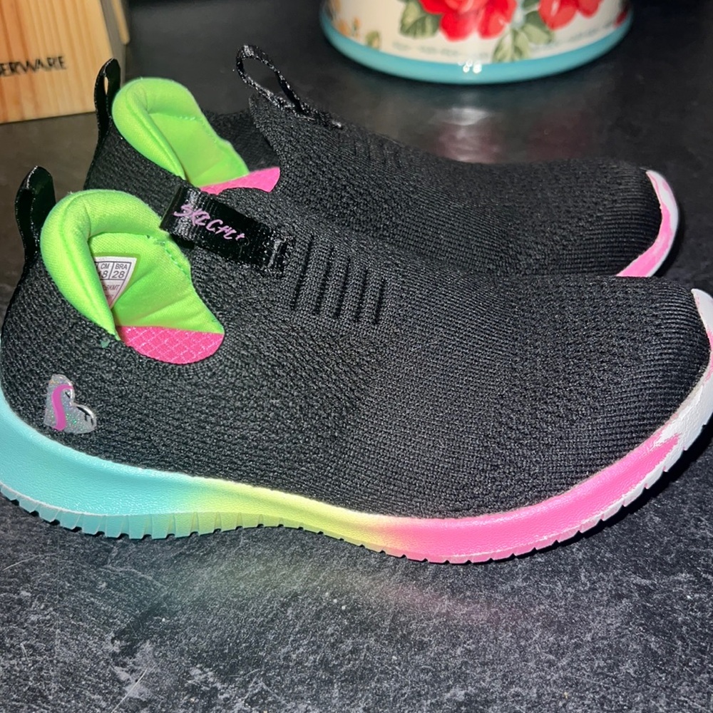 Lightly used size 12 memory foam slip on sketchers for girls